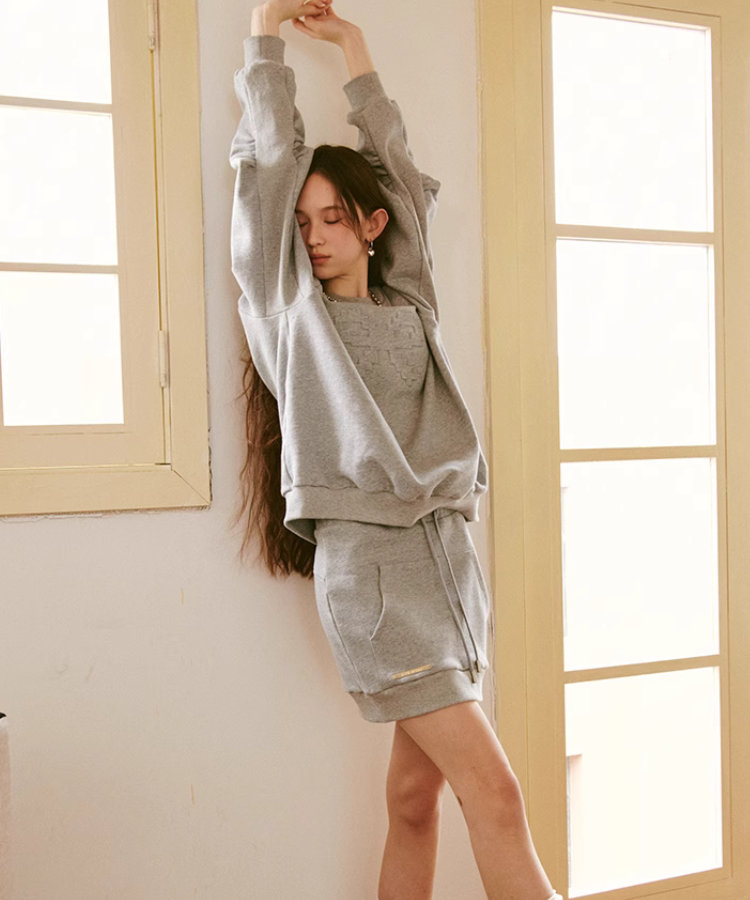 シャーリングアーム立体リボンスウェットプルオーバー