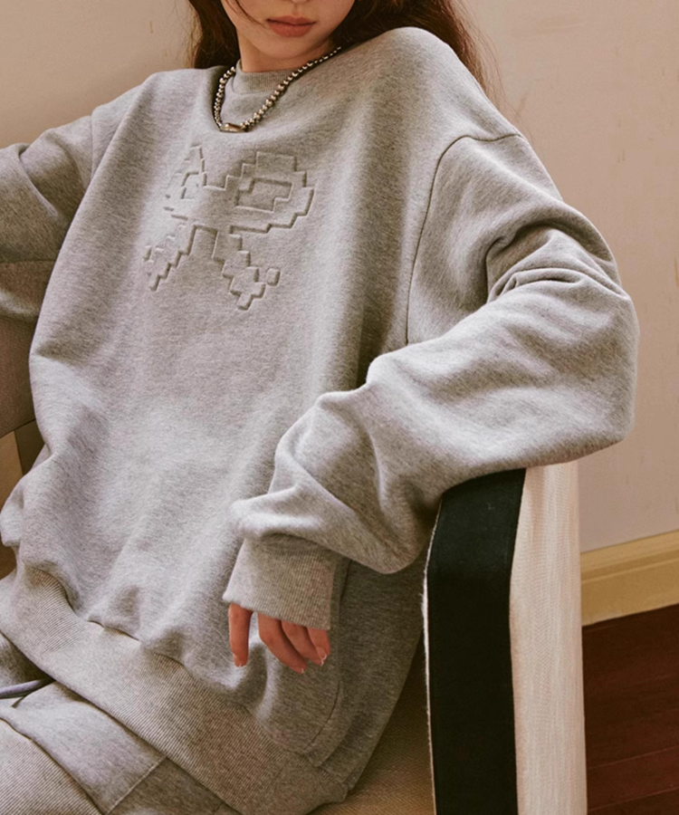 シャーリングアーム立体リボンスウェットプルオーバー